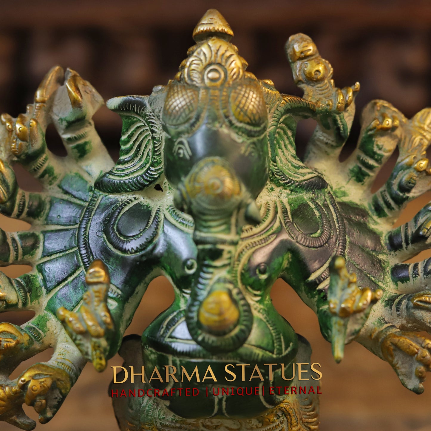 Brass Sixteen-Armed Vira-Ganesh, Green Patina & Golden Finish, 9"