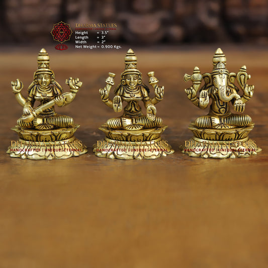 Brass Saraswati, Lakshmi and Ganesh seated on a Lotus, Golden Finish, 3.5"