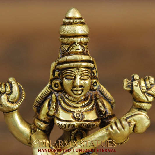 Brass Saraswati, Lakshmi and Ganesh seated on a Lotus, Golden Finish, 3.5"