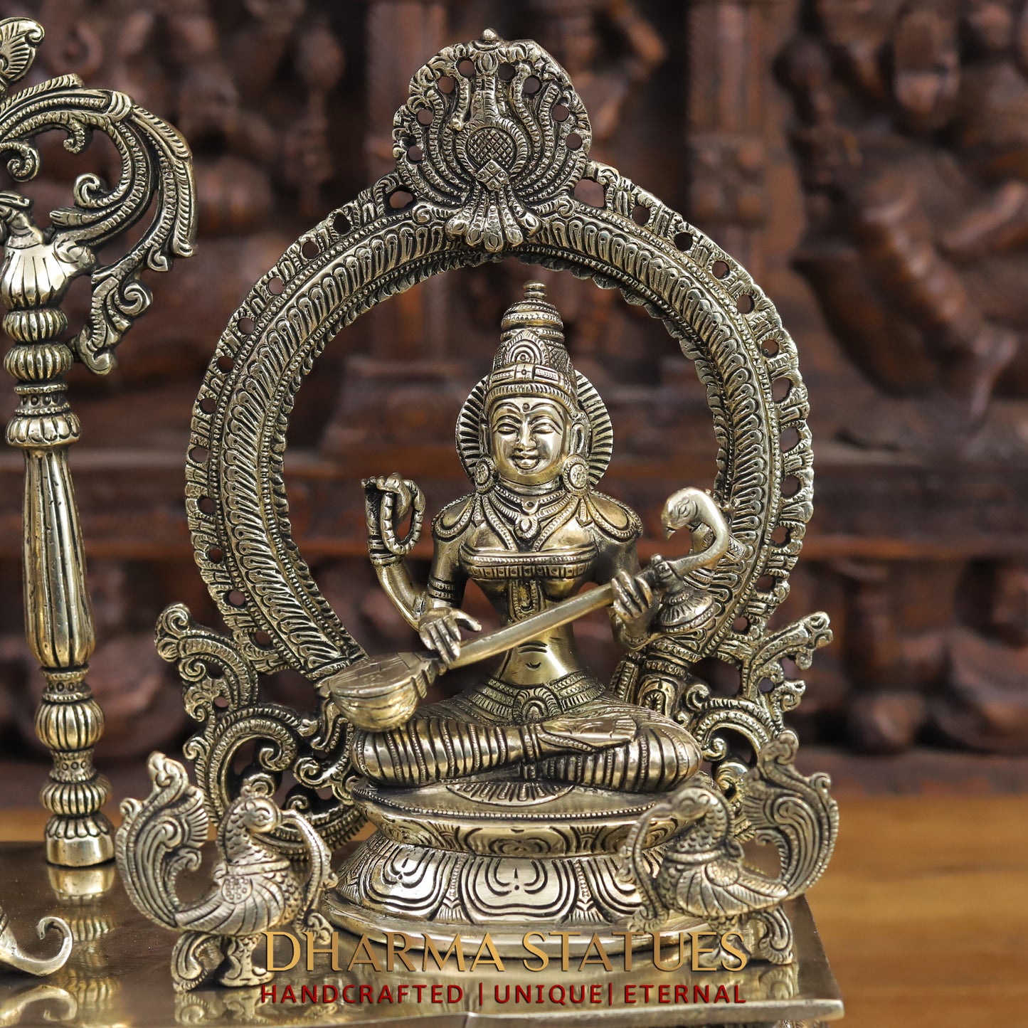 brass ganesh, lakshmi, and saraswati idols