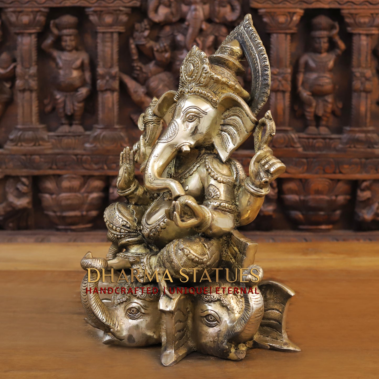 Brass Ganesh seated on Elephant Base, Fine Golden Finish, 16.5"