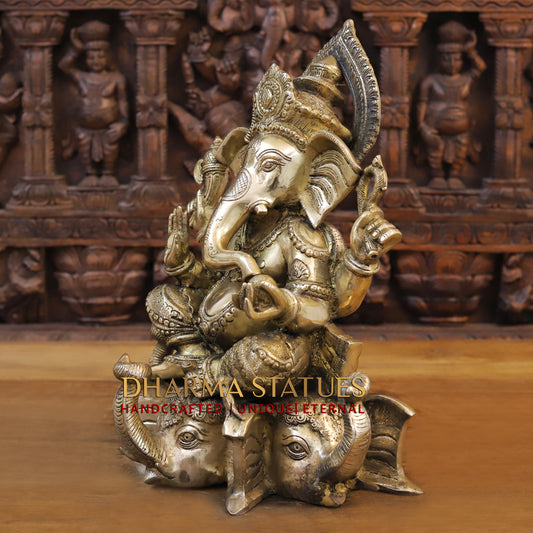 Brass Ganesh seated on Elephant Base, Fine Golden Finish, 16.5"
