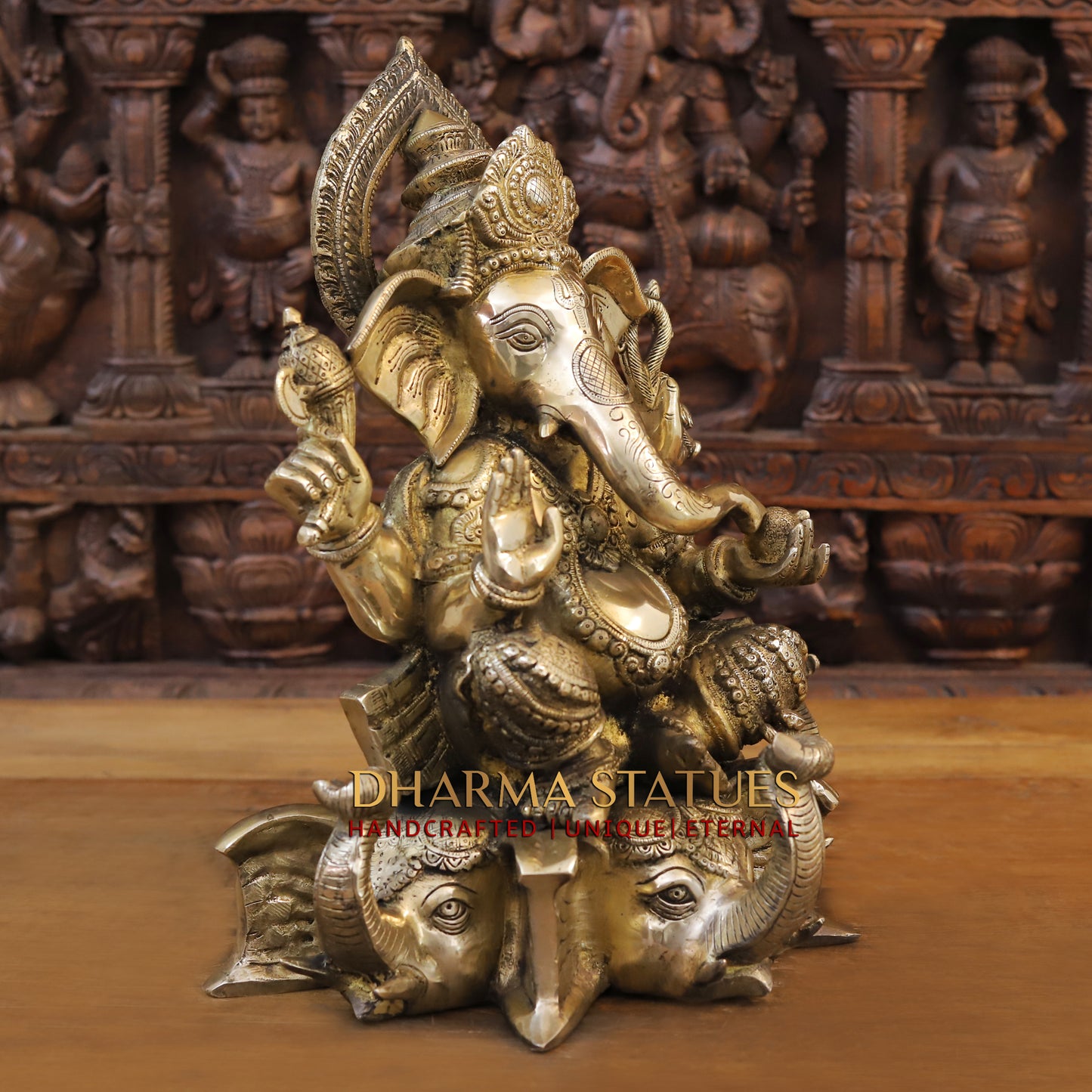 Brass Ganesh seated on Elephant Base, Fine Golden Finish, 16.5"