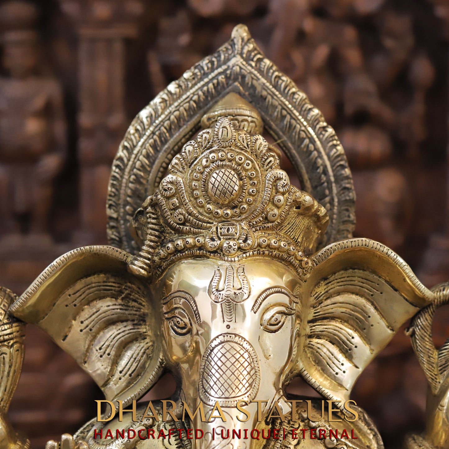 Brass Ganesh seated on Elephant Base, Fine Golden Finish, 16.5"