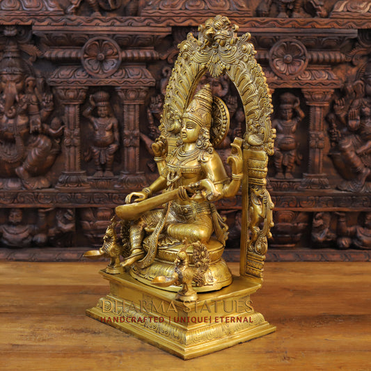 Brass Saraswati Statue Adorned in Yaksh Grandeur, Harmony of Knowledge, Fine Golden Finish 24"