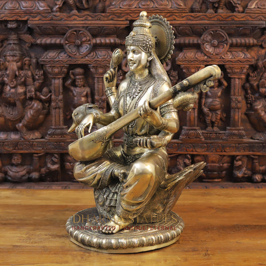 Brass Saraswati Idol, seated on swan, Fine Golden Finish 24"