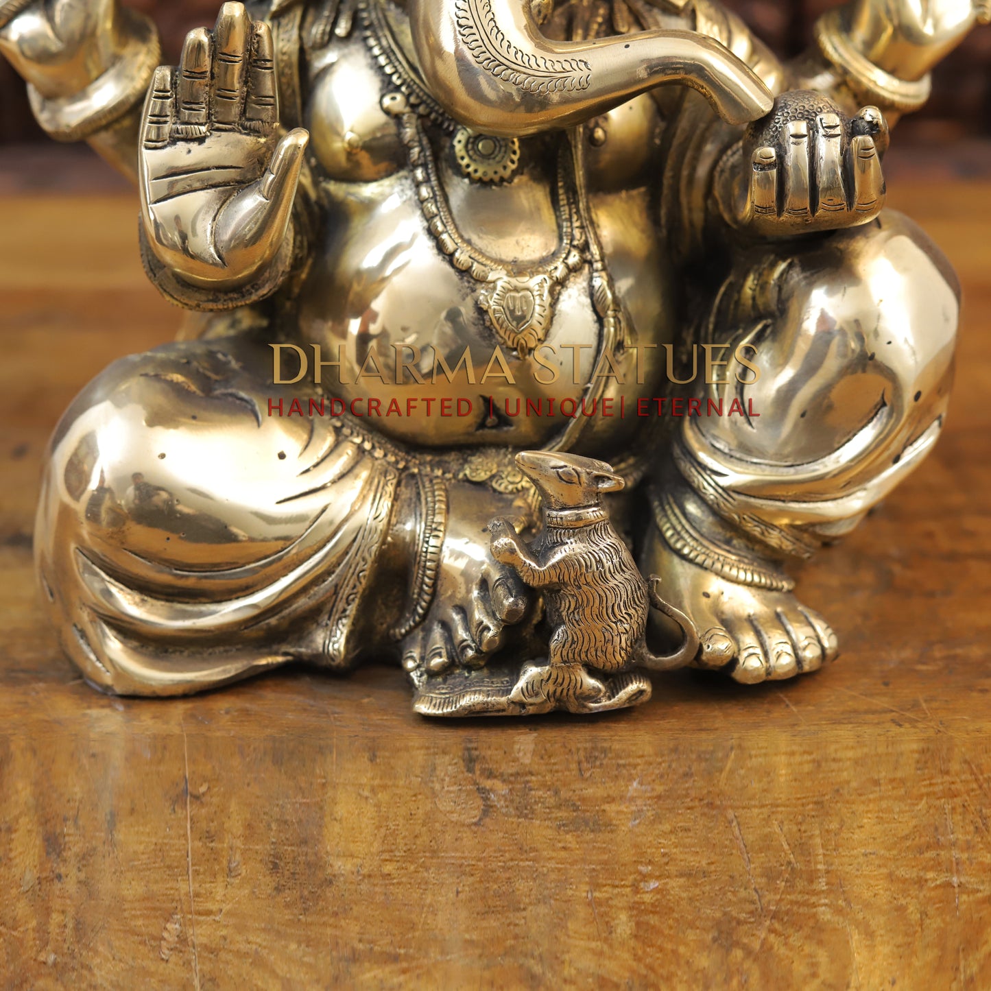 Brass Ganesh seated with tilted neck, Golden Finish, 13.5"