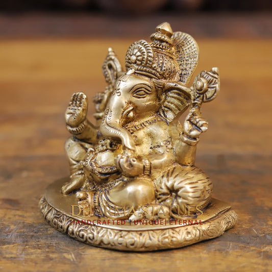 Brass Ganesha Statue, Seated On a Round Base, Fine Golden Finish