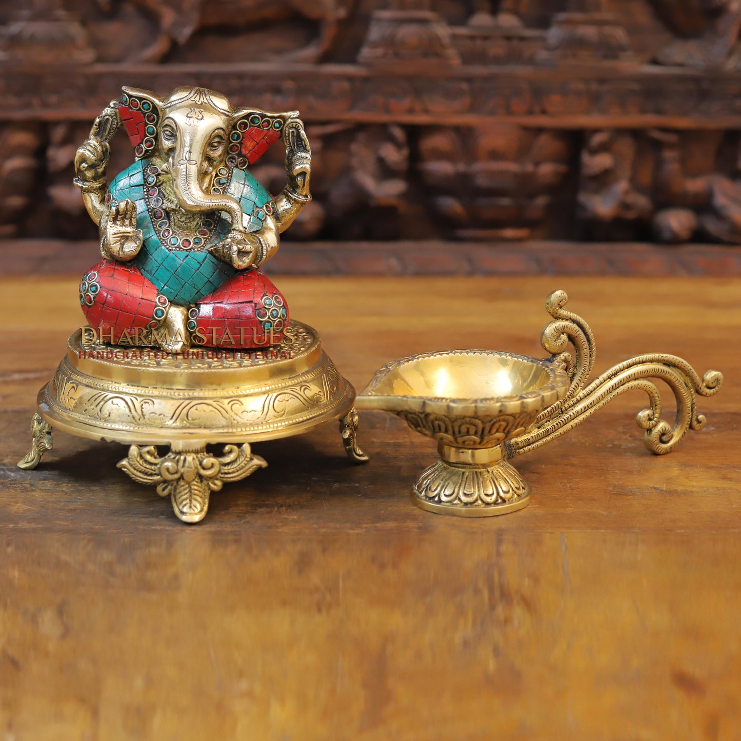 Brass Ganesh seated with tilted neck, Stone work, 5.5”