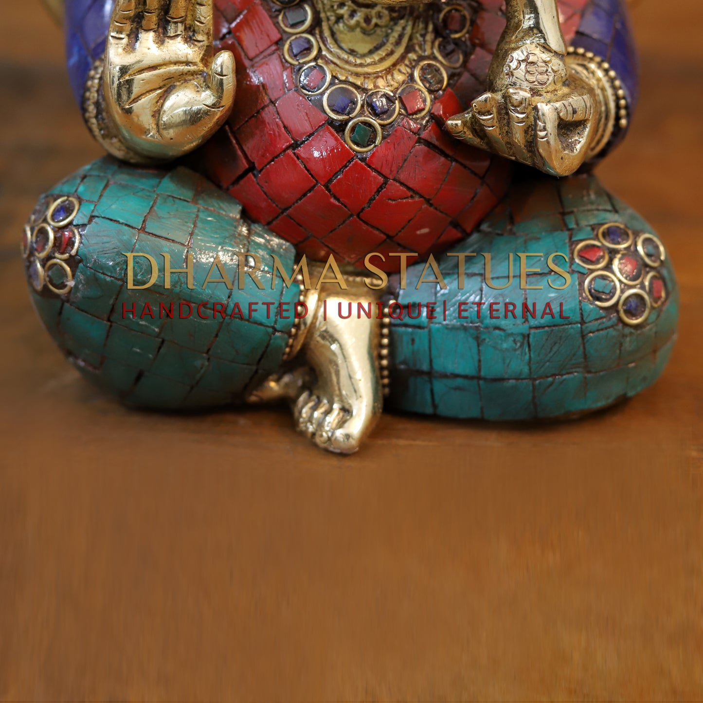 Brass Ganesh seated with tilted neck, Golden & Stone work, 7"