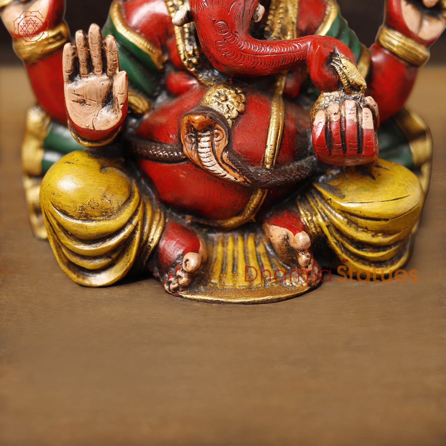 Brass Ganesh Seated, Hand painted vibrant red and yellow colors, 8.5"
