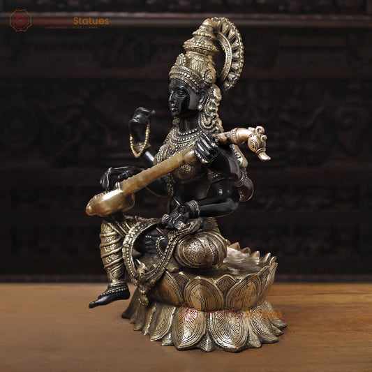 Brass Saraswati Idol, Seated on a Lotus Flower, Black Patina with Golden Finish, 27"