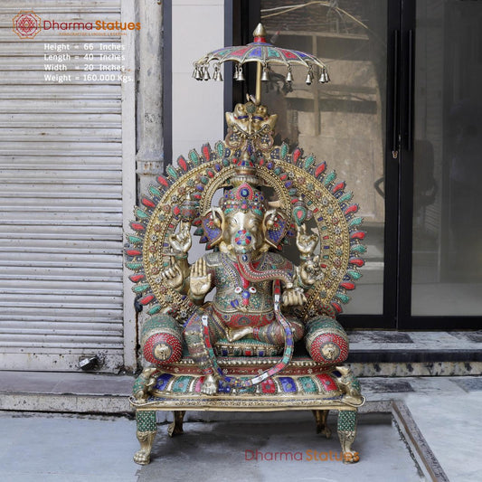 Brass Ganesh seated with Umbrella, Fine Stone work 66”