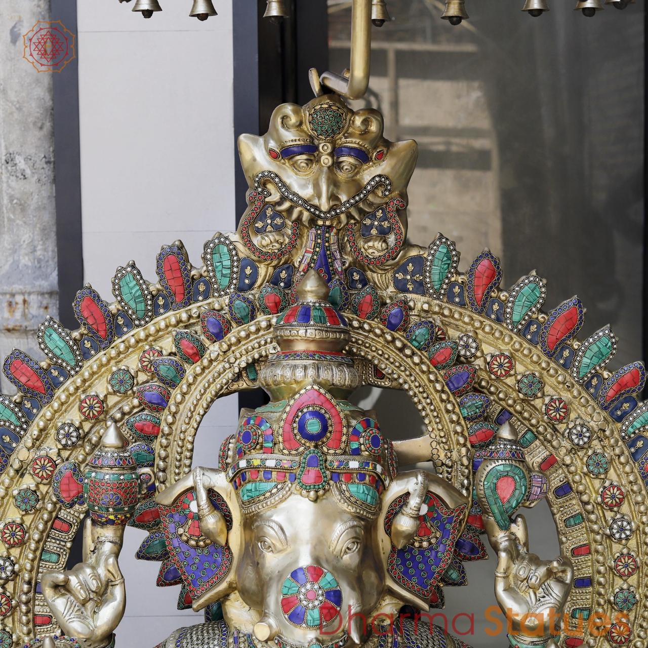 Brass Ganesh seated with Umbrella, Fine Stone work 66”