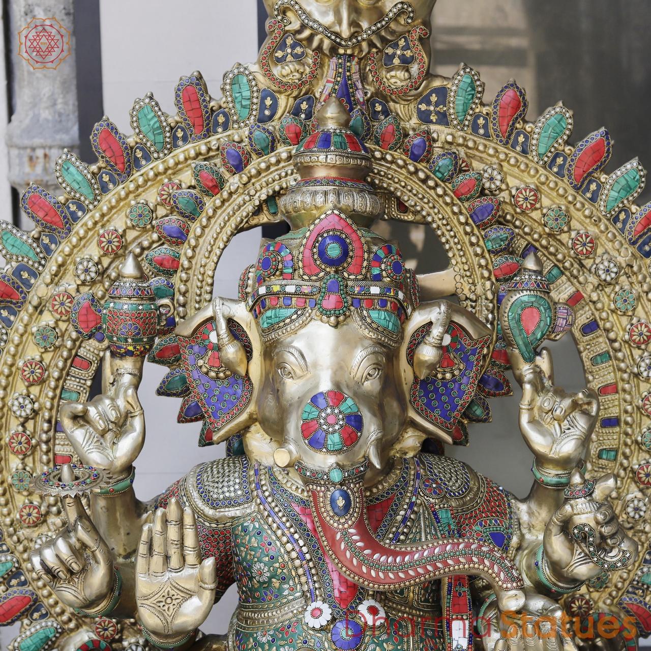 Brass Ganesh seated with Umbrella, Fine Stone work 66”