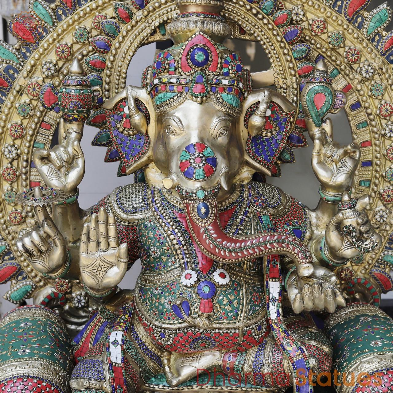 Brass Ganesh seated with Umbrella, Fine Stone work 66”