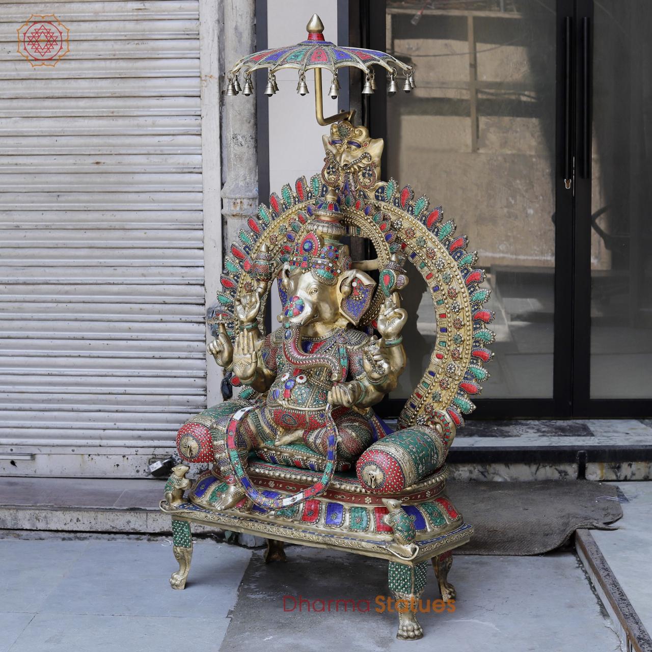 Brass Ganesh seated with Umbrella, Fine Stone work 66”