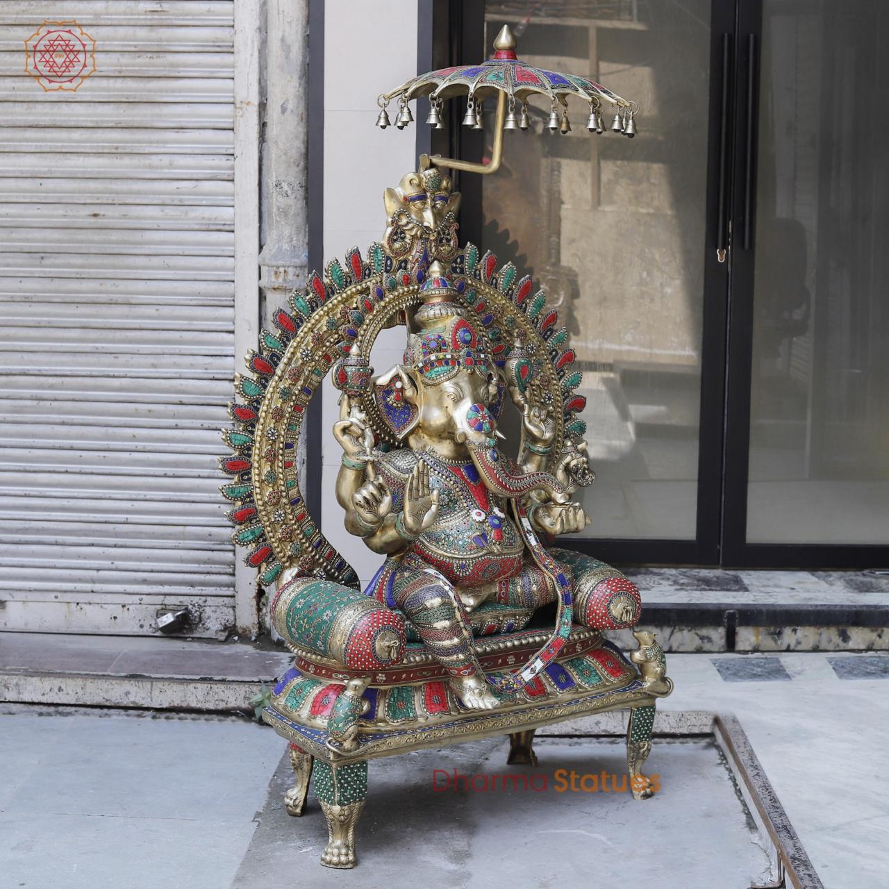 Brass Ganesh seated with Umbrella, Fine Stone work 66”