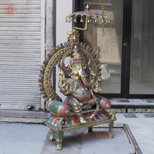 Brass Ganesh seated with Umbrella, Fine Stone work 66”