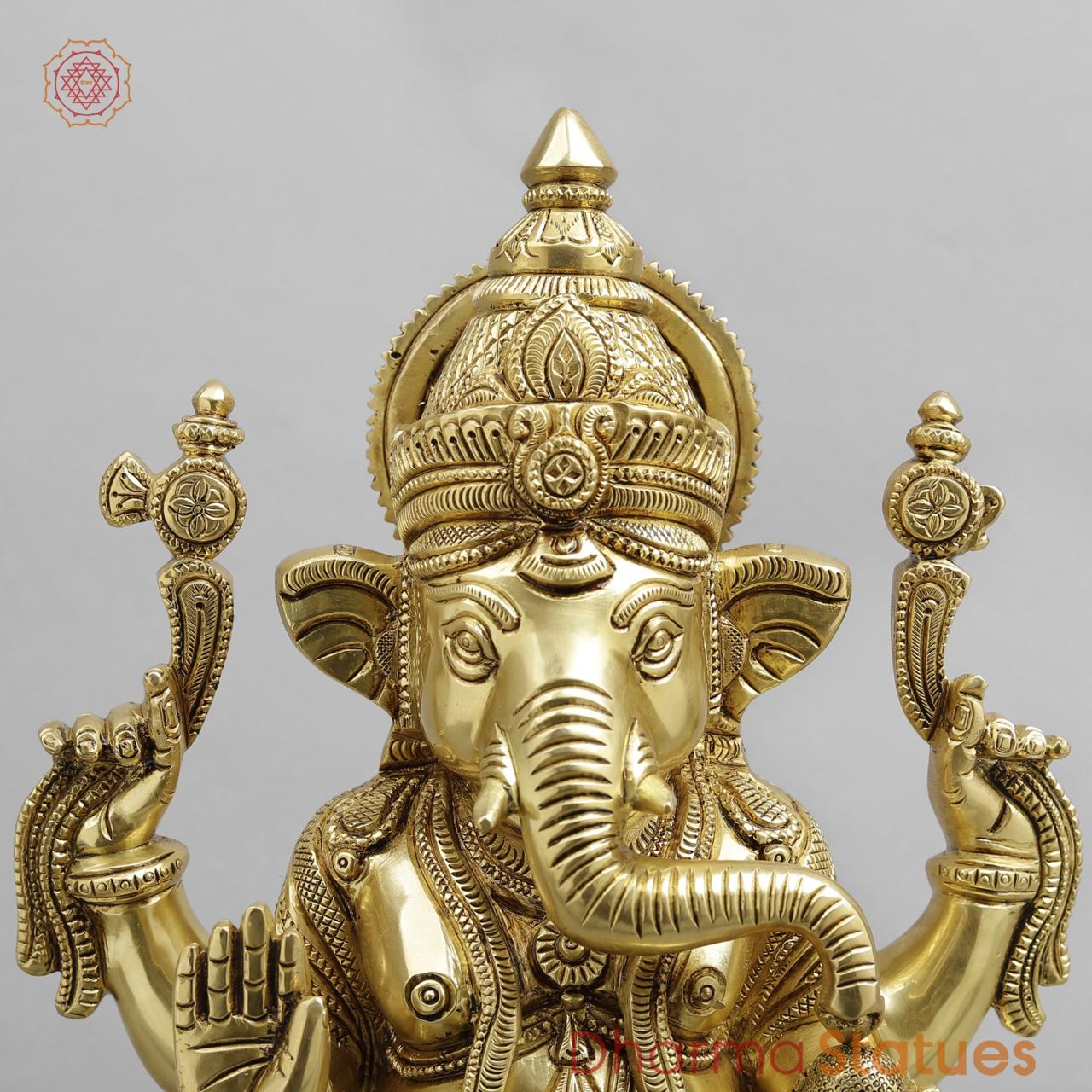 Brass Ganesh seated Fine on Chowki base, super fine Golden finish 15”