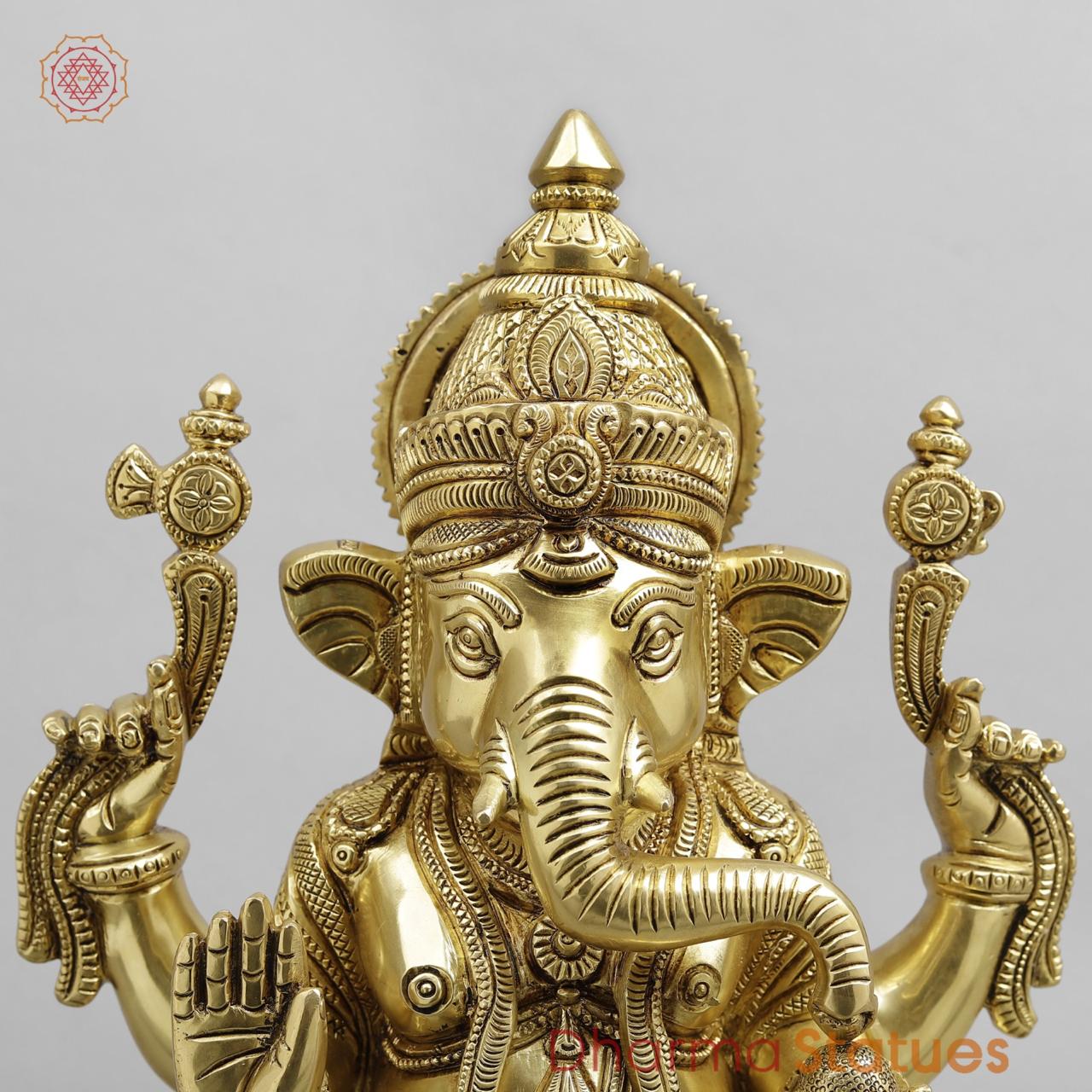 Brass Ganesh seated Fine on Chowki base, super fine Golden finish 15”
