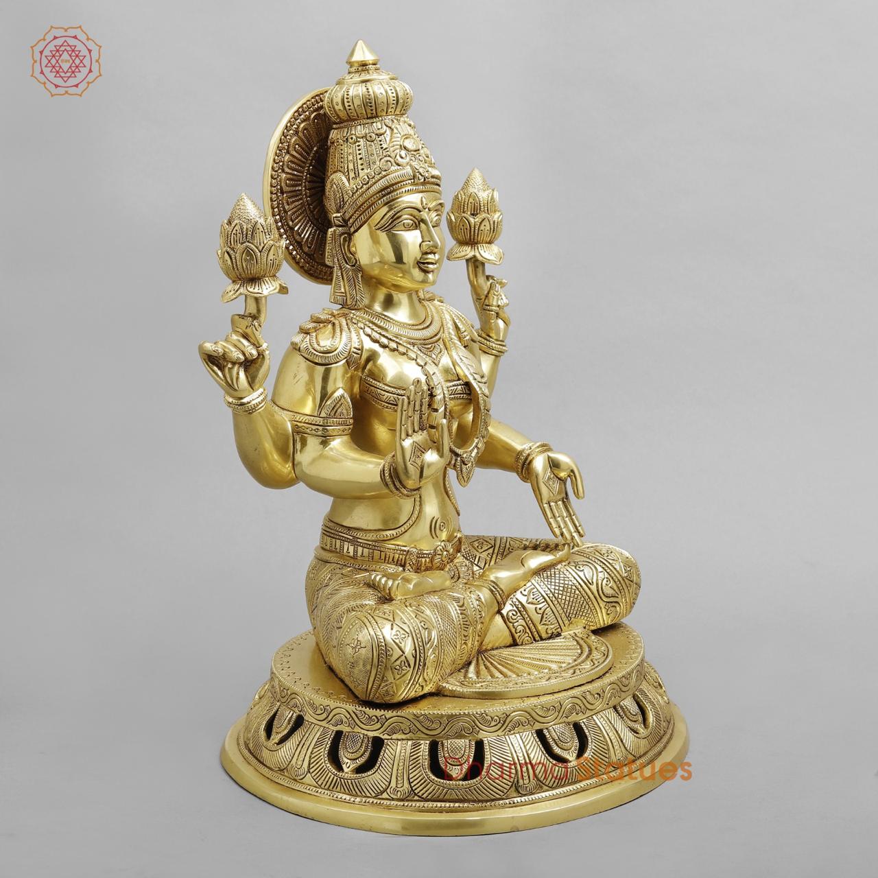 Brass Lakshmi seated fine Carving, Fine Golden finish 17.5”