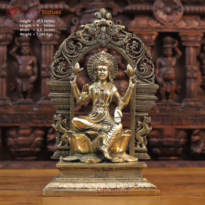 Brass Lakshmi Statue, Seated on Lotus in Yaksh Frame - Fine Golden Finish 15.5"