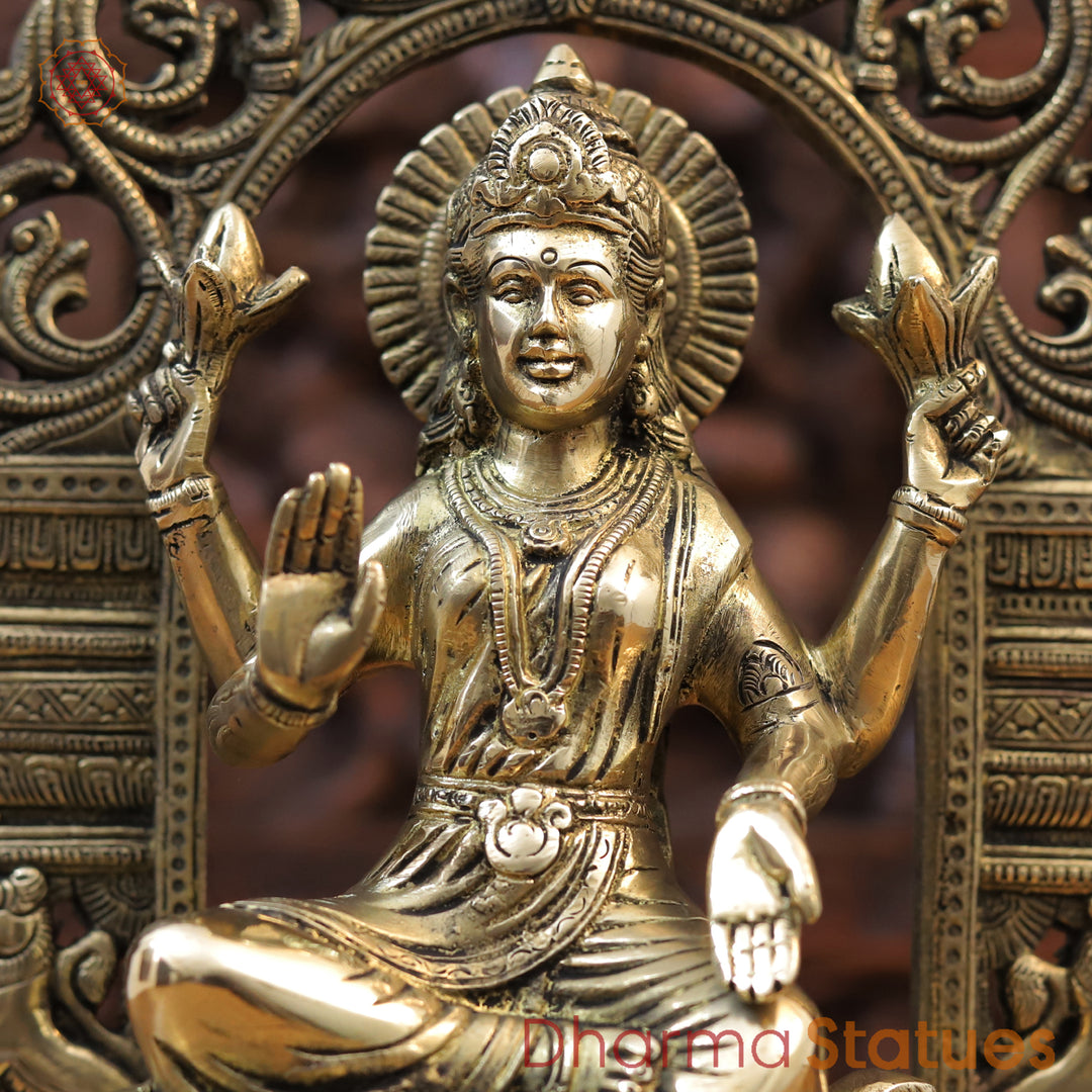 Brass Lakshmi Statue, Seated on Lotus in Yaksh Frame - Fine Golden Finish 15.5"