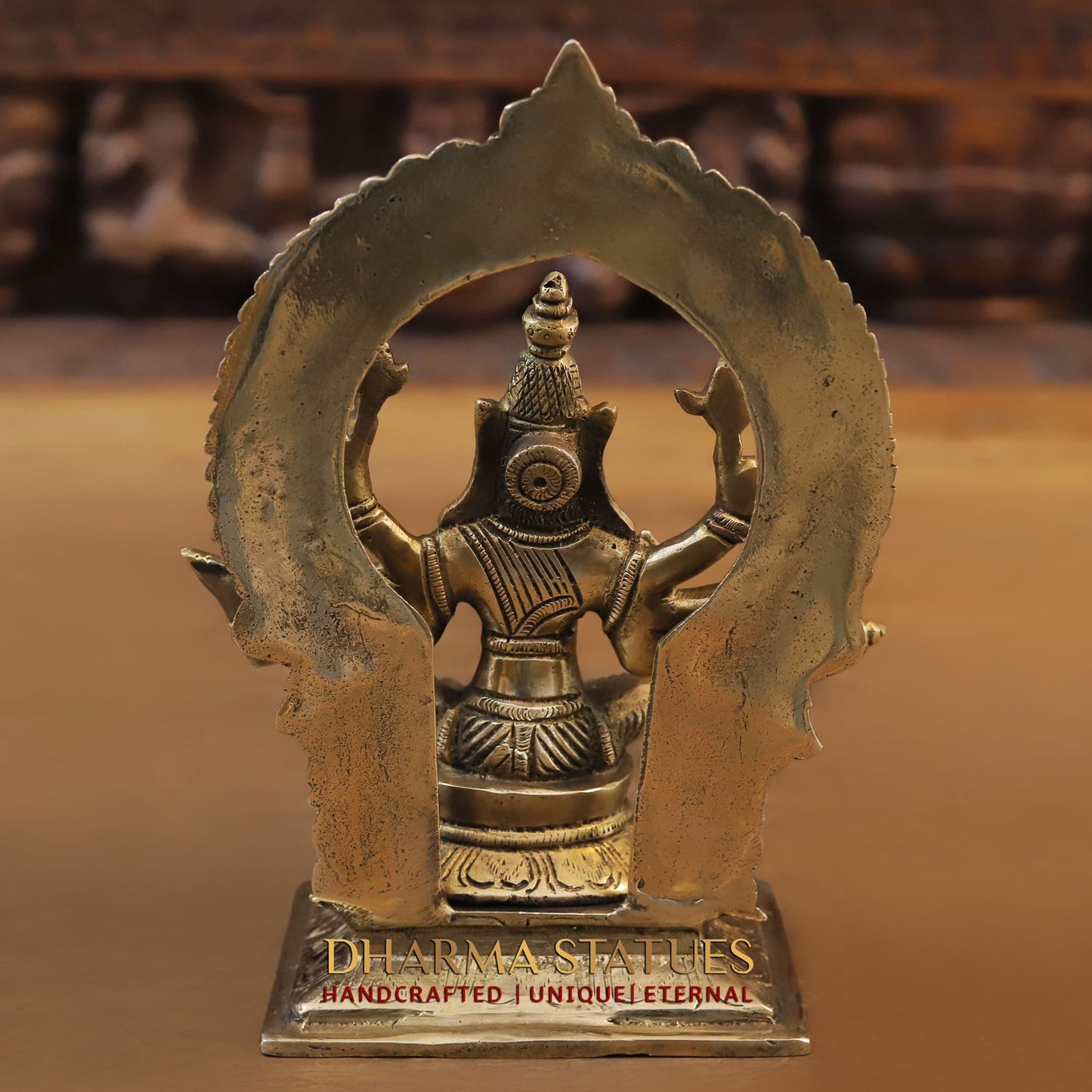 Brass Varaha (Lord Vishnu) in Seated Posture with Frame Behind Him. 8"