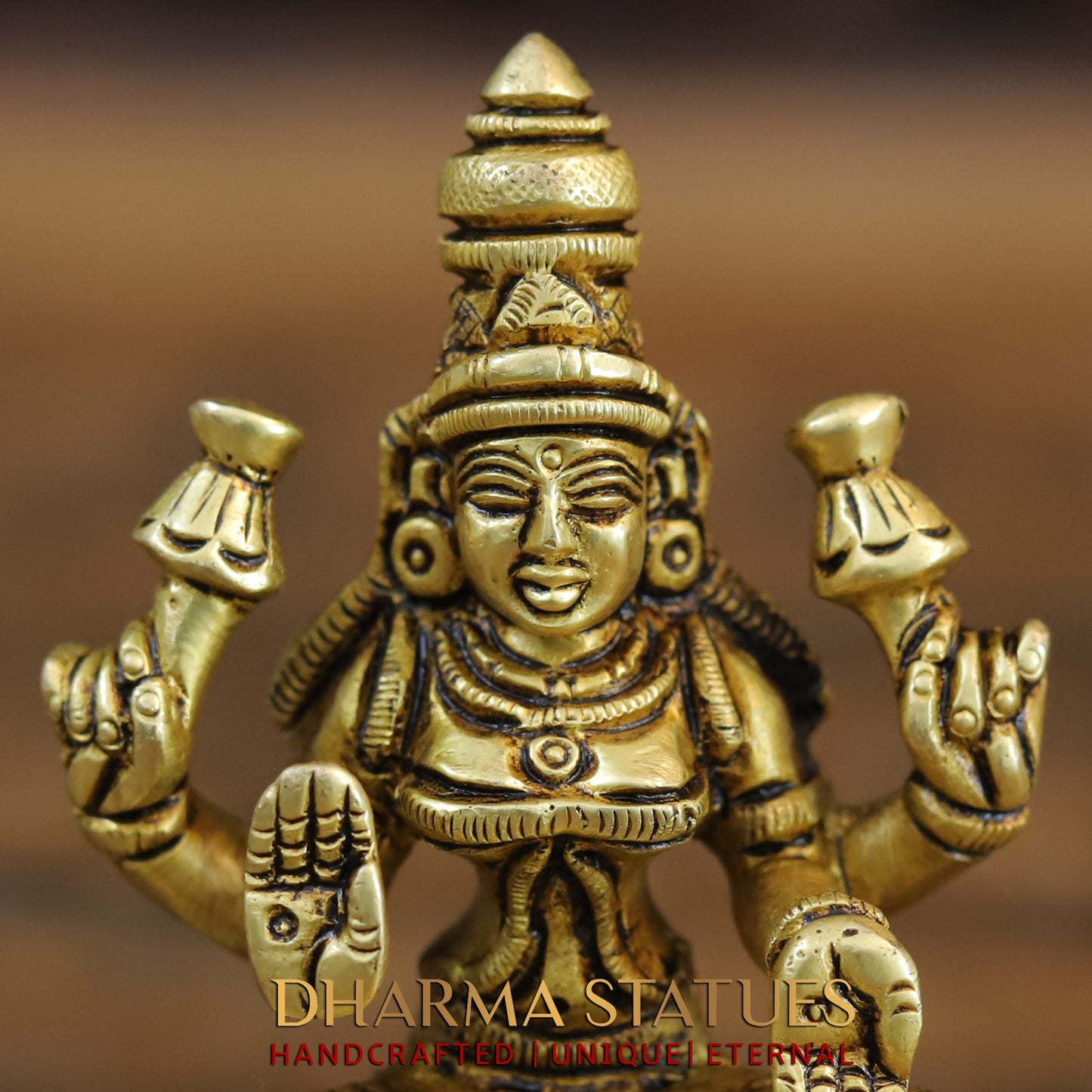 Brass Saraswati, Lakshmi and Ganesh seated on a Lotus, Golden Finish, 3.5"