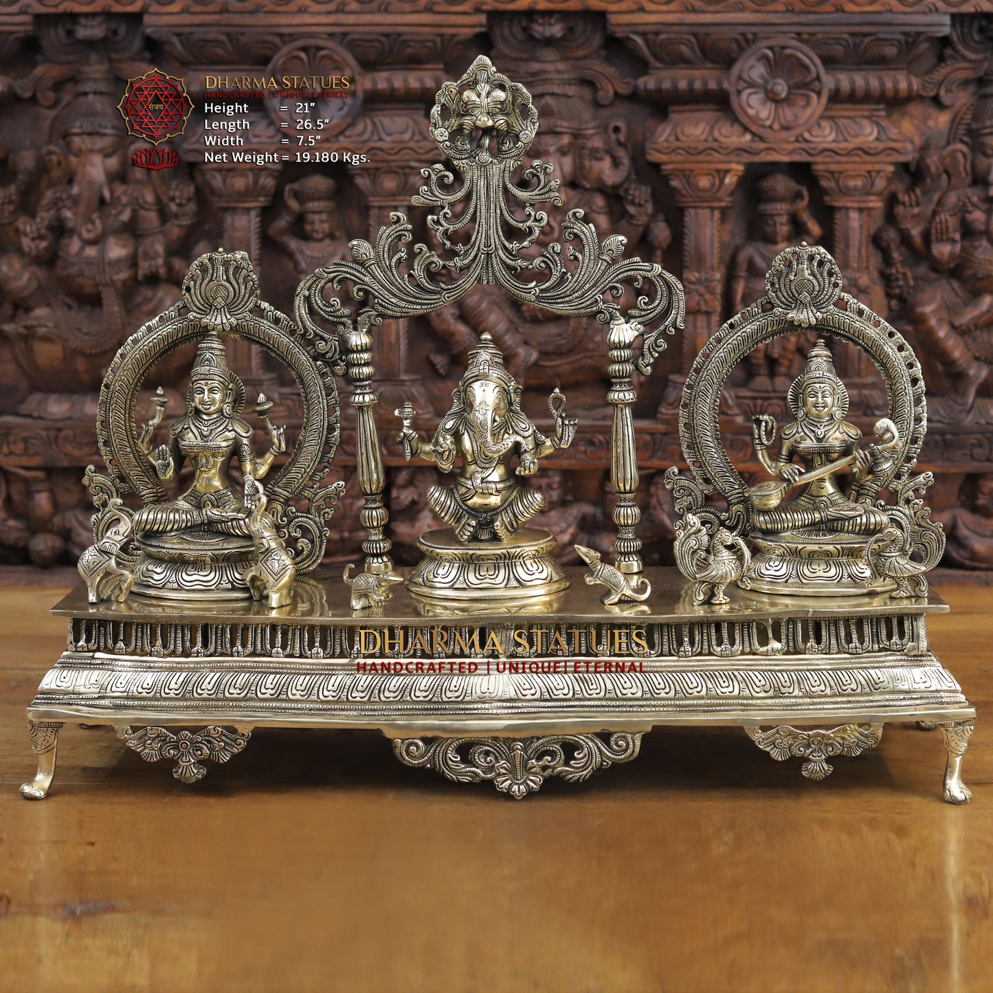brass ganesh, lakshmi, and saraswati idols