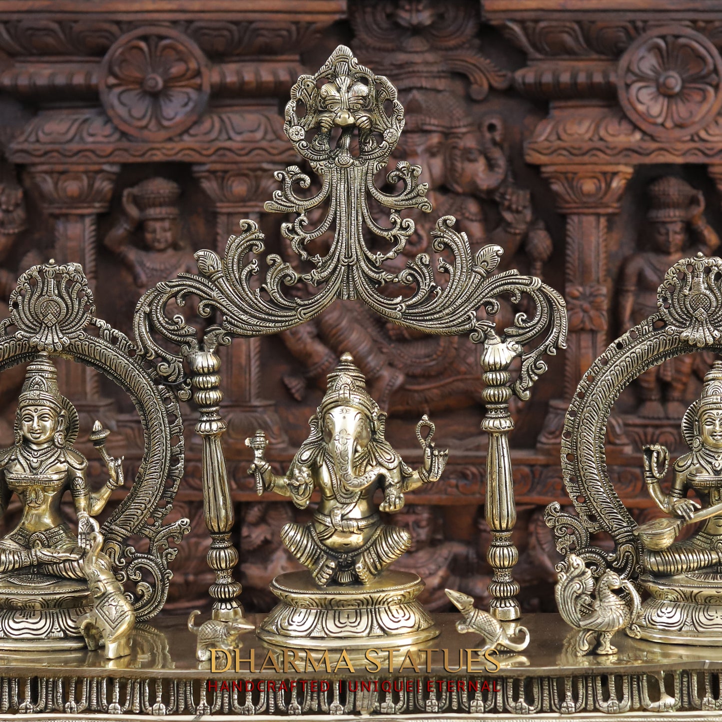 brass ganesh, lakshmi, and saraswati idols
