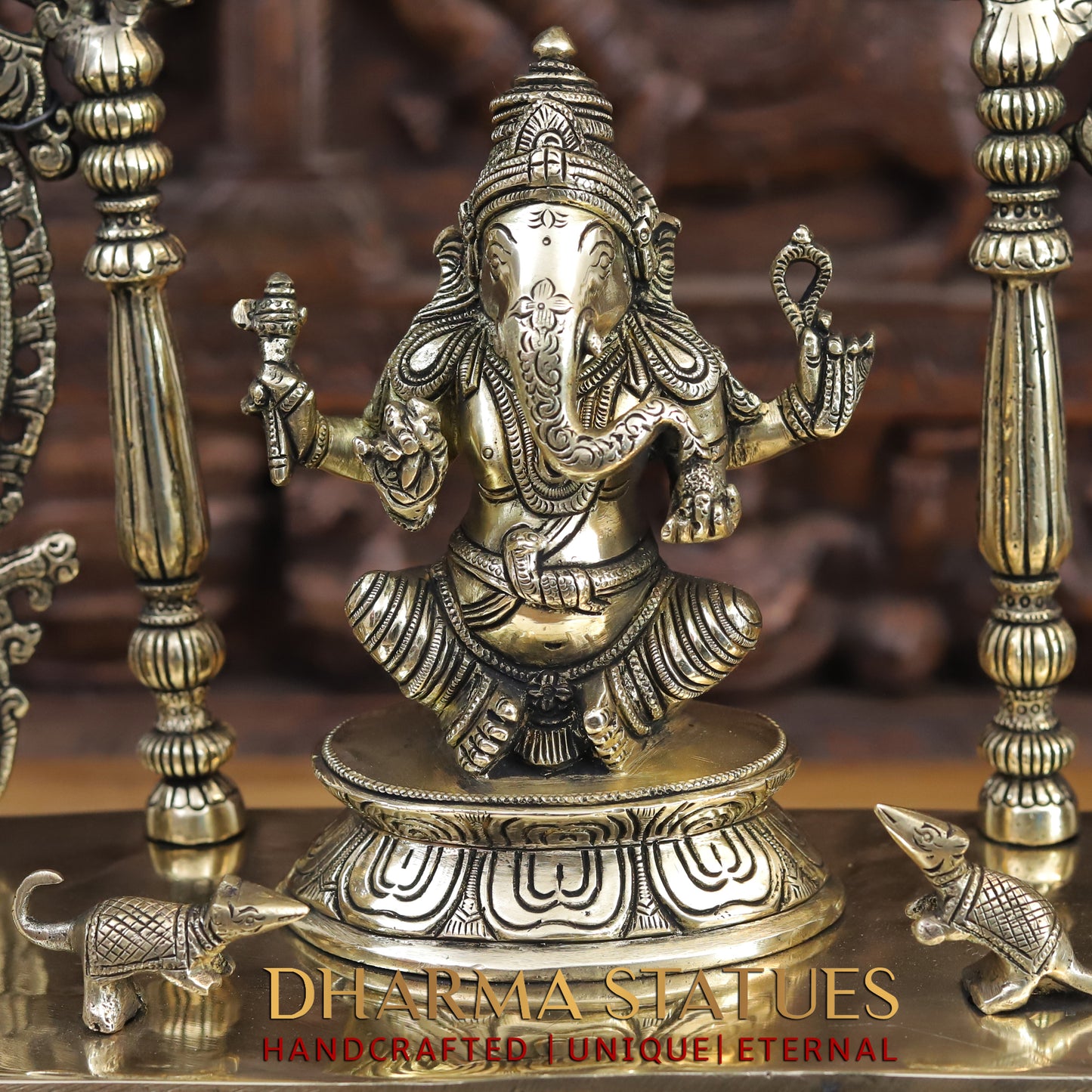 brass ganesh, lakshmi, and saraswati idols