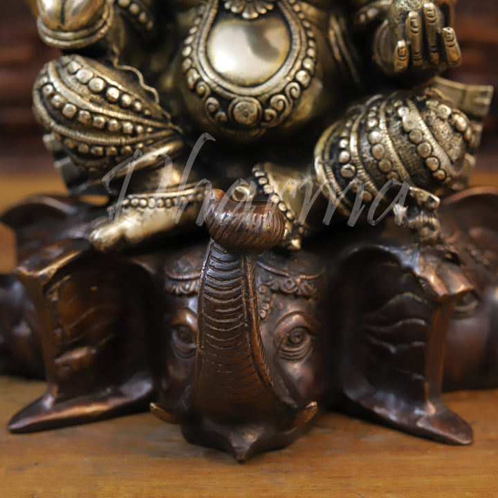 Brass Lord Ganesh Idol, Seated on Elephant Heads, Golden and Copper Finish 16.5"