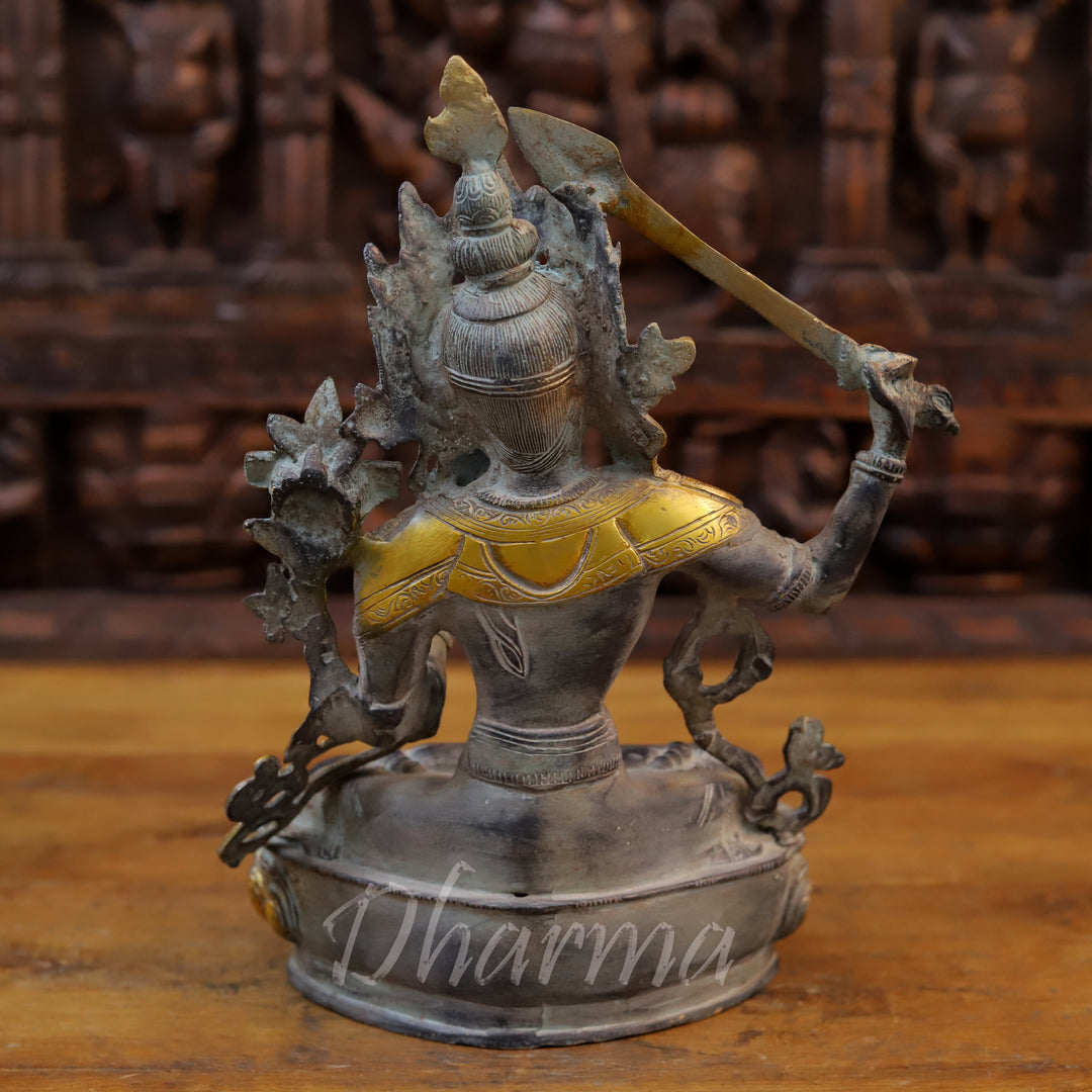 Brass Tara Idol, Seated on a Lotus, Holding a Sword, Black patina & Golden 12.5" back view