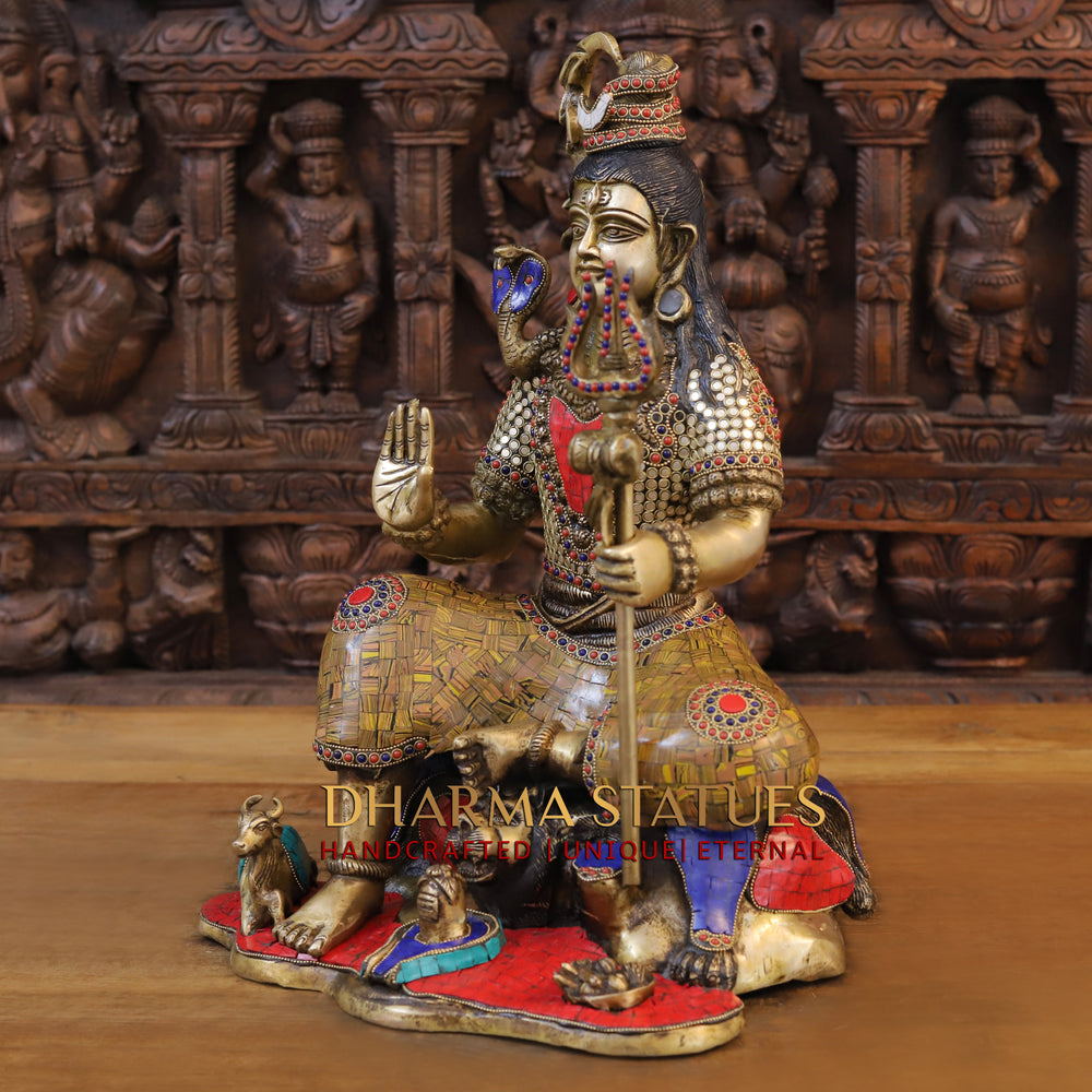 Brass Lord Shiva Idol, Seated on a lions skin, Golden and Stone work 18.5" side view