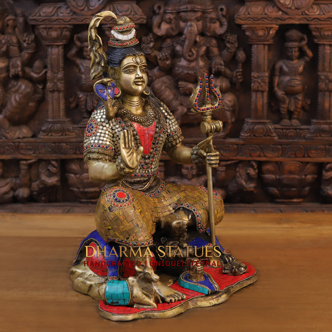 Brass Lord Shiva Idol, Seated on a lions skin, Golden and Stone work 18.5" side view