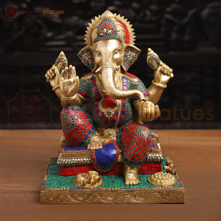 Brass Ganesh Sitting On Base With Sweets And Fruits (Stone Work) 16"