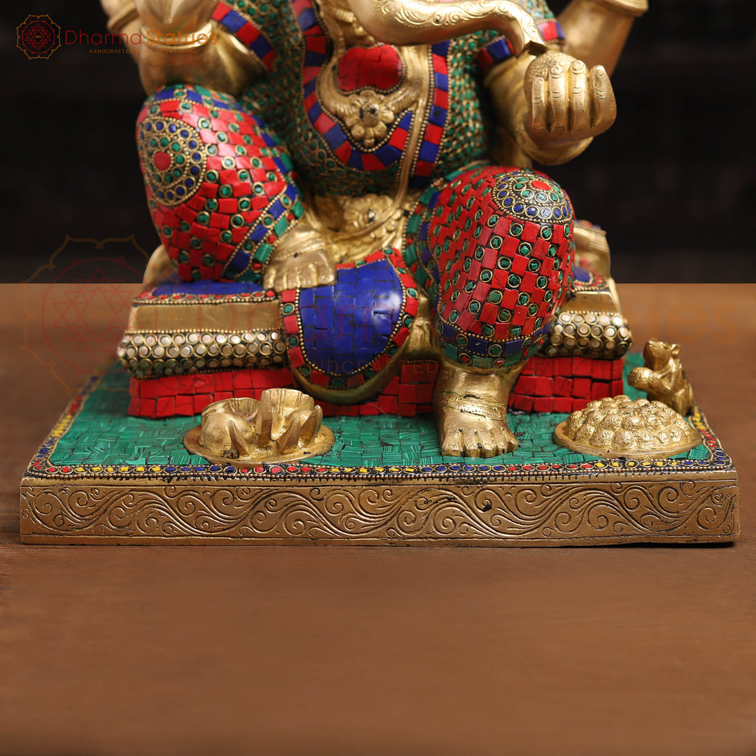 Brass Ganesh Sitting On Base With Sweets And Fruits (Stone Work) 16"