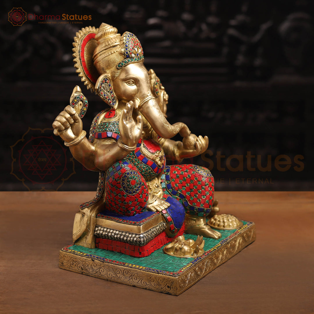 Brass Ganesh Sitting On Base With Sweets And Fruits (Stone Work) 16"