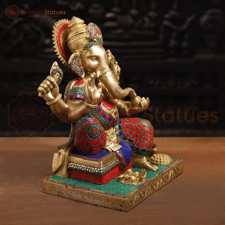 Brass Ganesh Sitting On Base With Sweets And Fruits (Stone Work) 16"