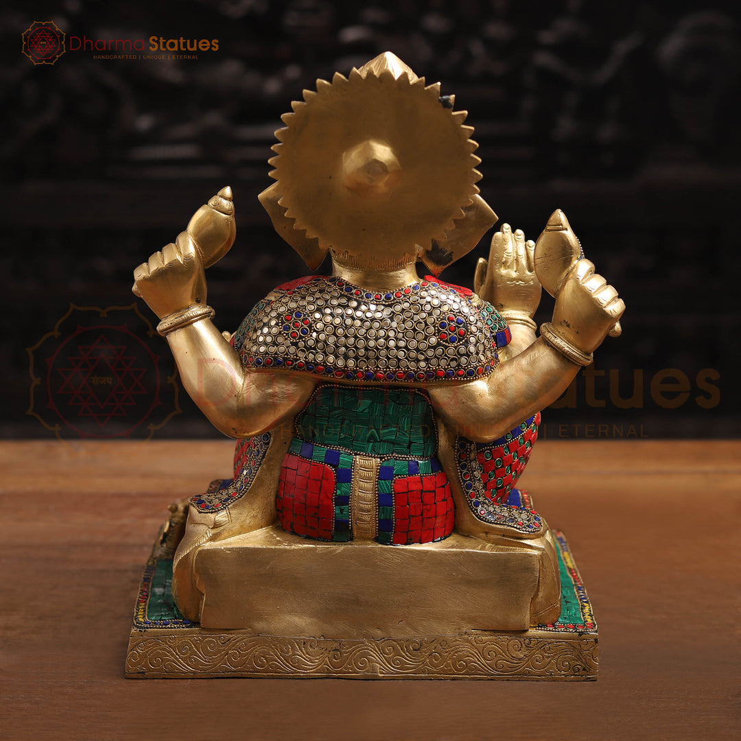 Brass Ganesh Sitting On Base With Sweets And Fruits (Stone Work) 16"