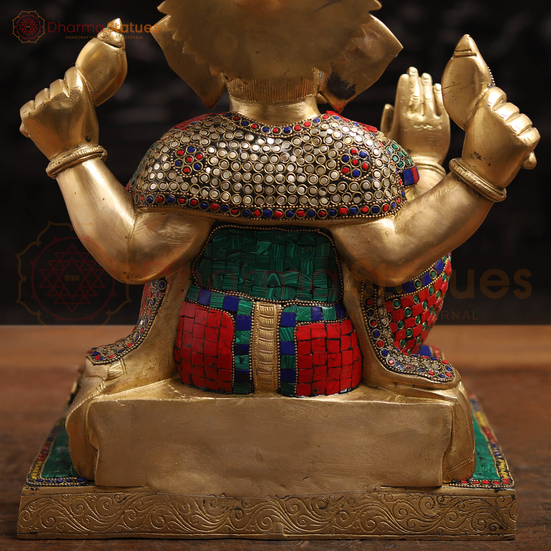 Brass Ganesh Sitting On Base With Sweets And Fruits (Stone Work) 16"