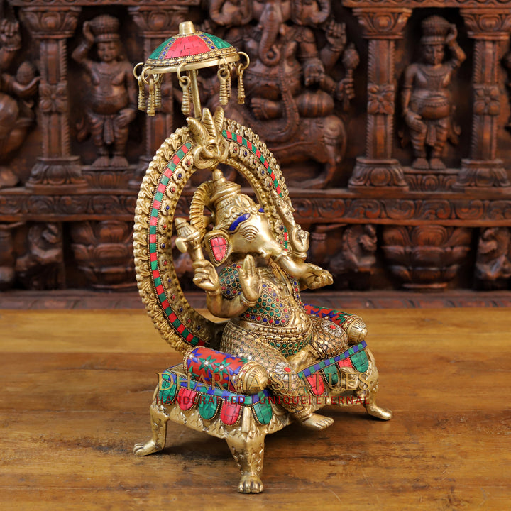 Brass Ganesh Statue, Seated on a Chowki, Fine Golden and Stone work 17.5" side view