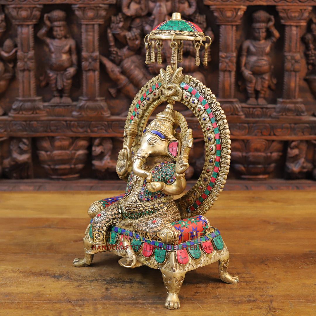 Brass Ganesh Statue, Seated on a Chowki, Fine Golden and Stone work 17.5" side view