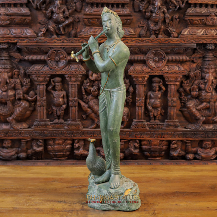 Brass Krishna Statue, Playing Flute Besides Peacock, Green patina Finish 29" side view