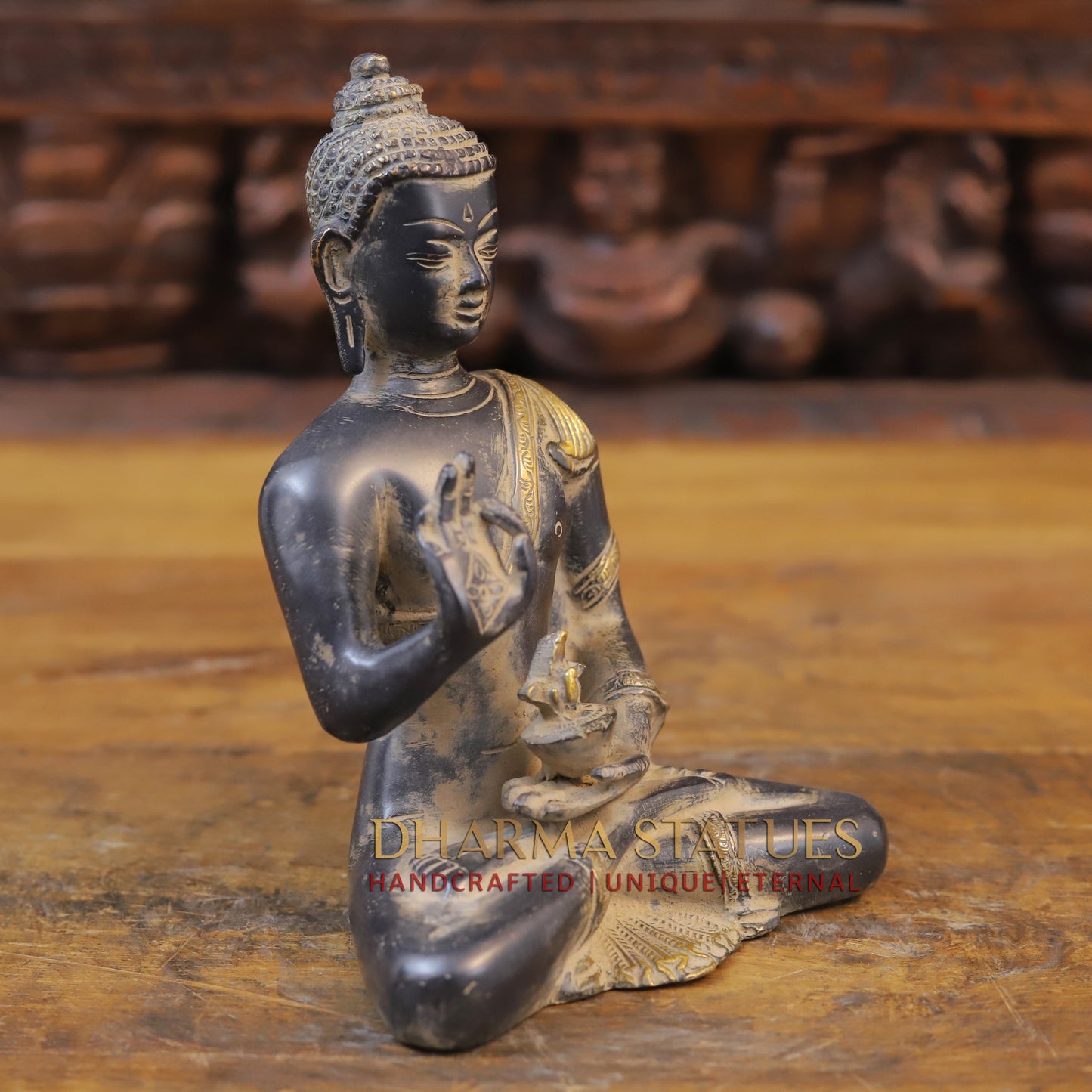 Brass Buddha seated in Blessing Posture, Black Patina & Golden Finish, 8"