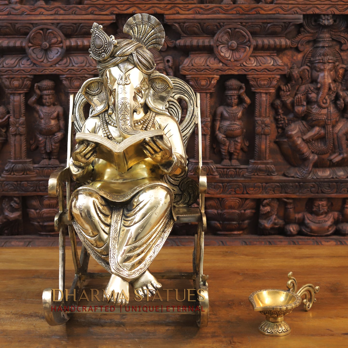 Brass Ganesh sitting on a Chair, Reading a Book, Golden Finish, 24"