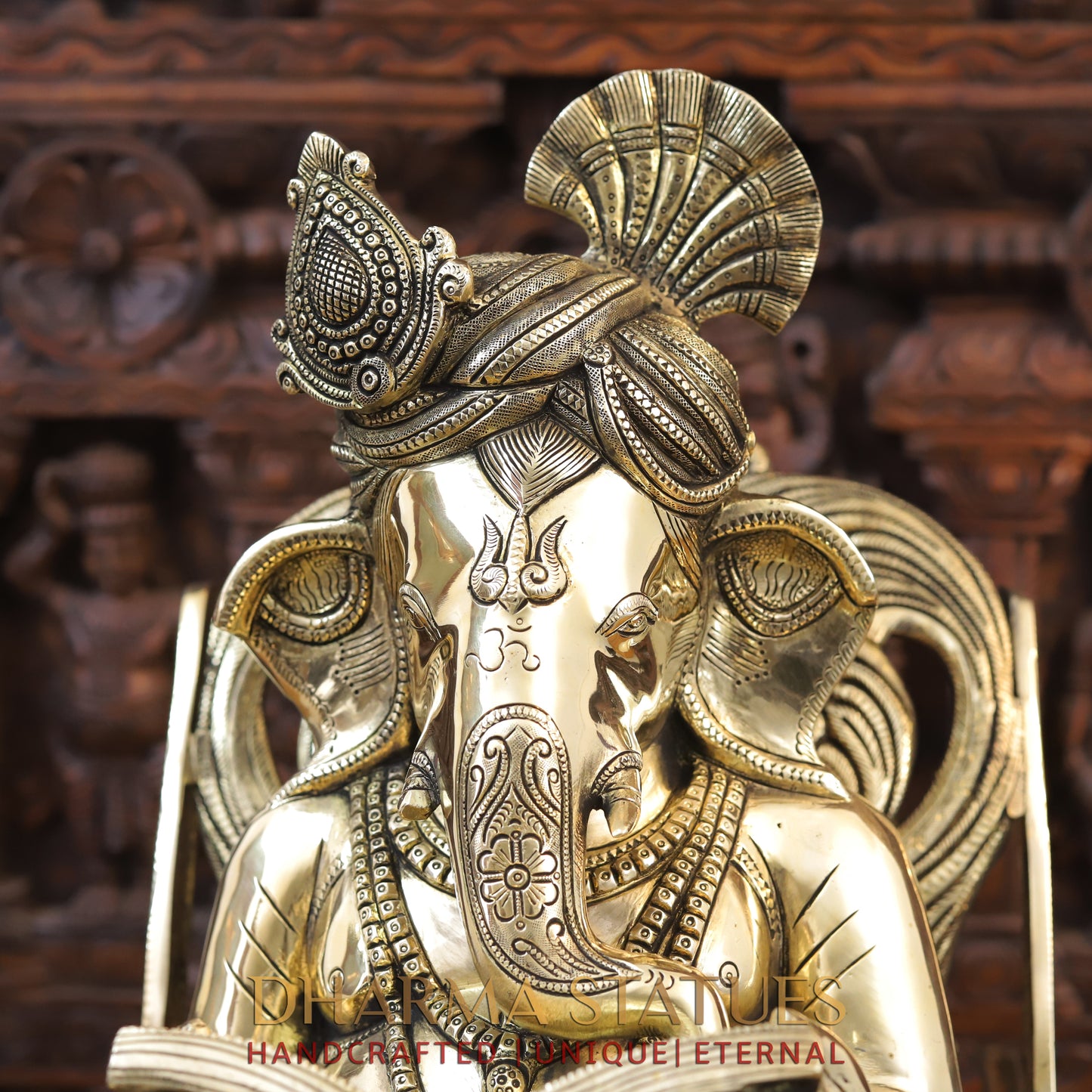 Brass Ganesh sitting on a Chair, Reading a Book, Golden Finish, 24"