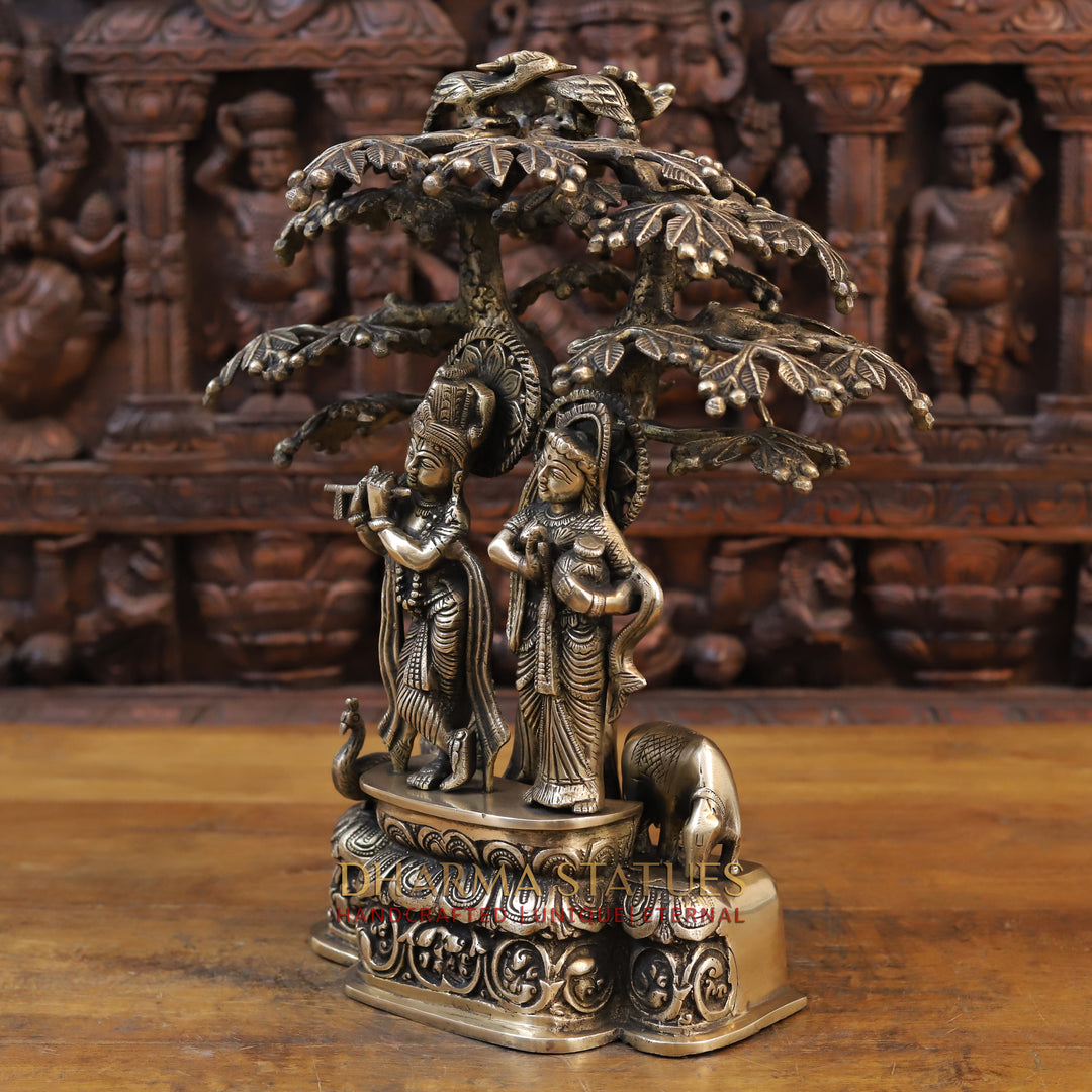 Brass Radha Krishna Statue, Standing Under a Tree, Golden Finish 17.5" side view